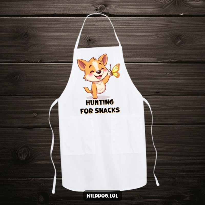 Funny apron with a wild dog character happily attempting to catch a shimmering butterfly while cooking.