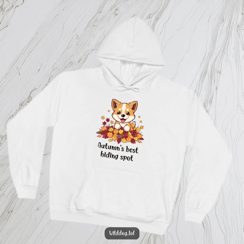 Funny wild dog playfully pouncing into a pile of autumn leaves on a soft hoodie, ultimate fall comfort.