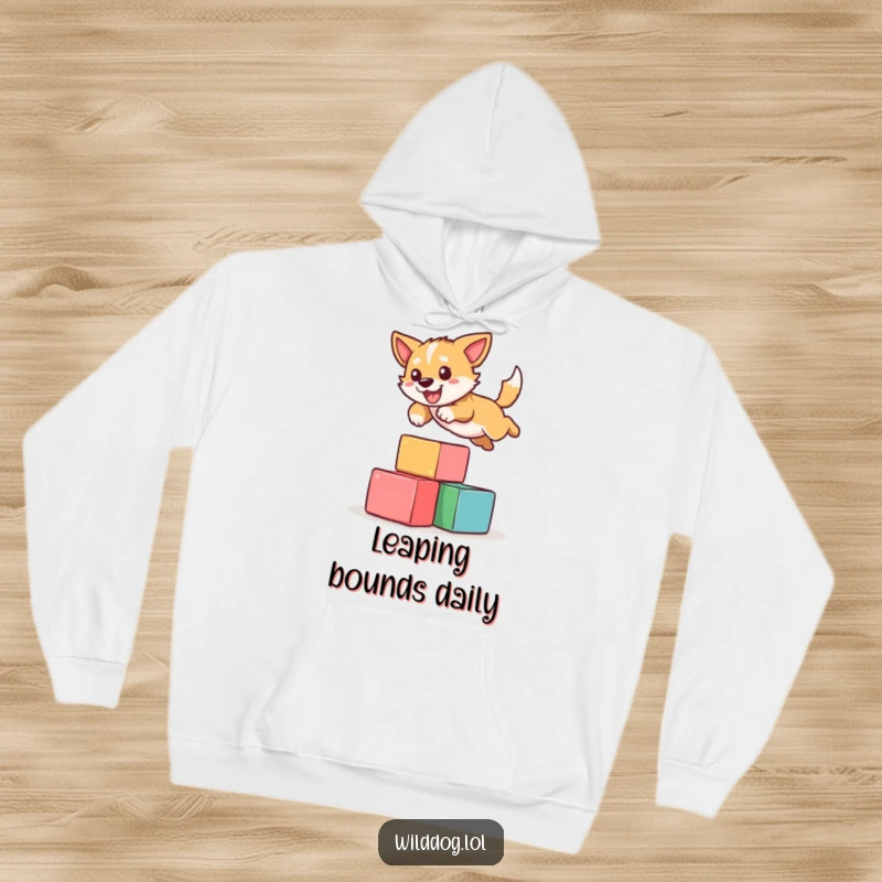 Funny hoodie featuring a happy wild dog performing a comical leap over colorful blocks, radiating energy and playful athleticism.