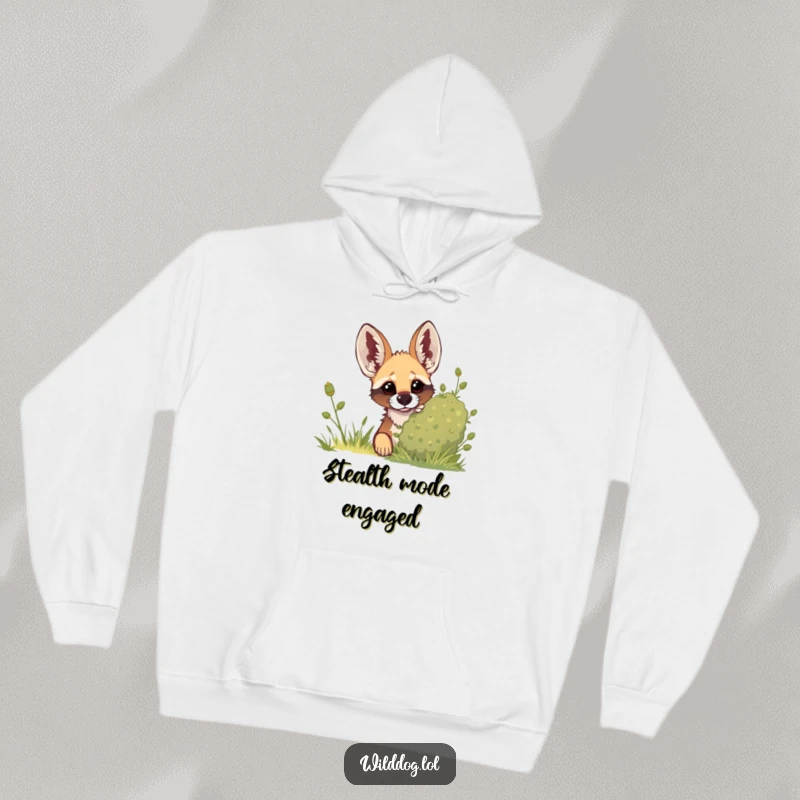 Funny hoodie showing a wild dog peeking curiously from behind dense foliage, its ears attentively raised.