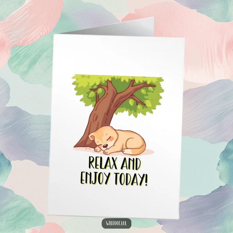 Funny free printable birthday card showing a contented wild dog fast asleep under a leafy tree on a sunny day.