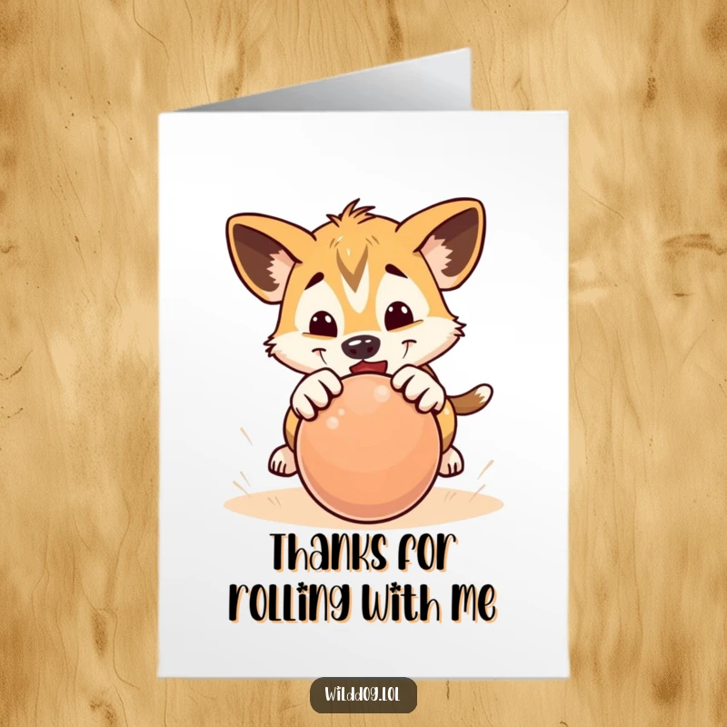 Funny Free Printable Thank You Card: A wild dog puppy playfully pounces on a rolling ball, conveying thanks with energetic charm.