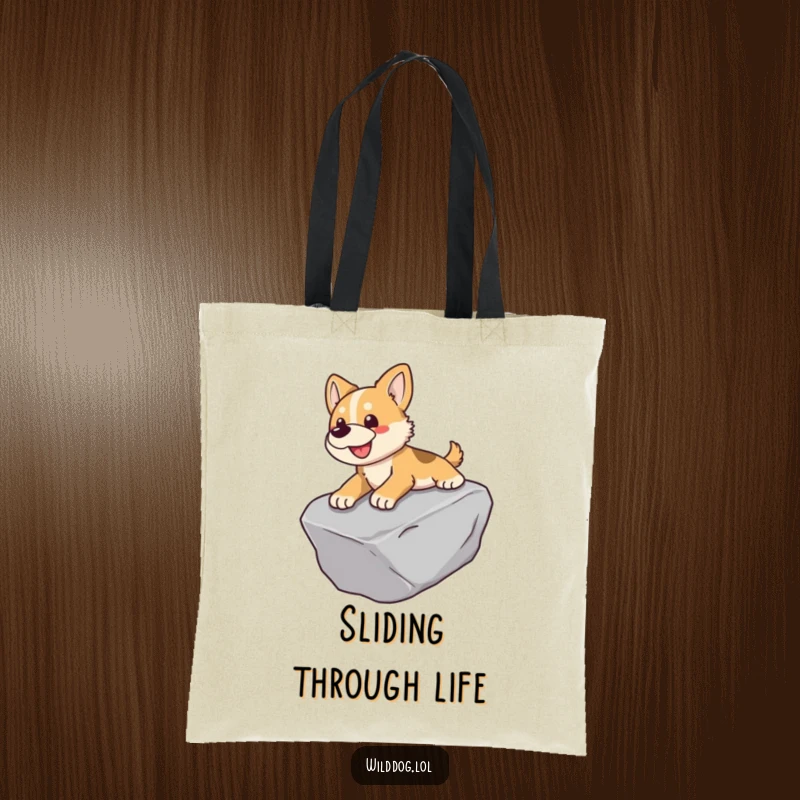 Funny tote bag showcasing a wild dog in mid-slide down a smooth rock.